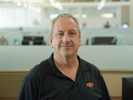 Man in a black collared shirt