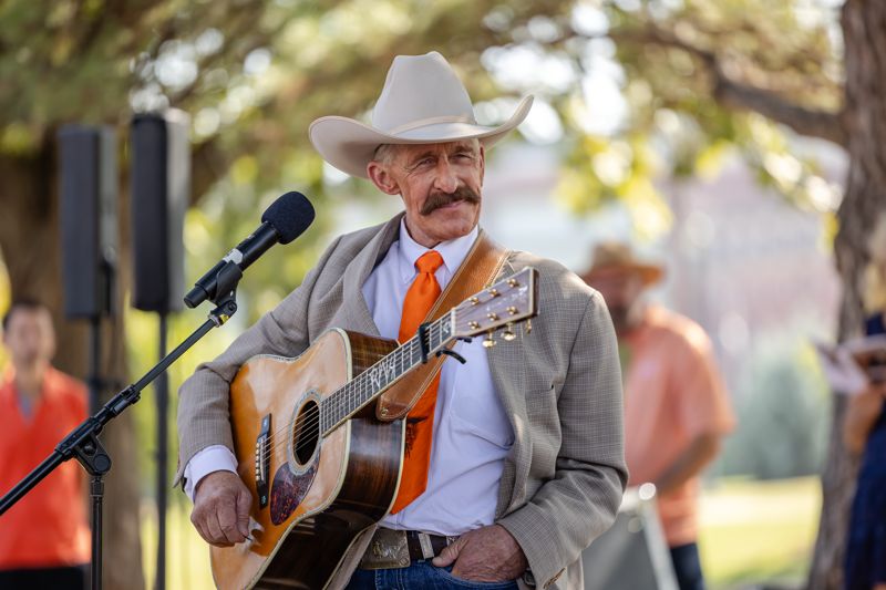 R.W. Hampton, family friend of the Holdens, performed two songs for the dedication, one written by Edna Mae.