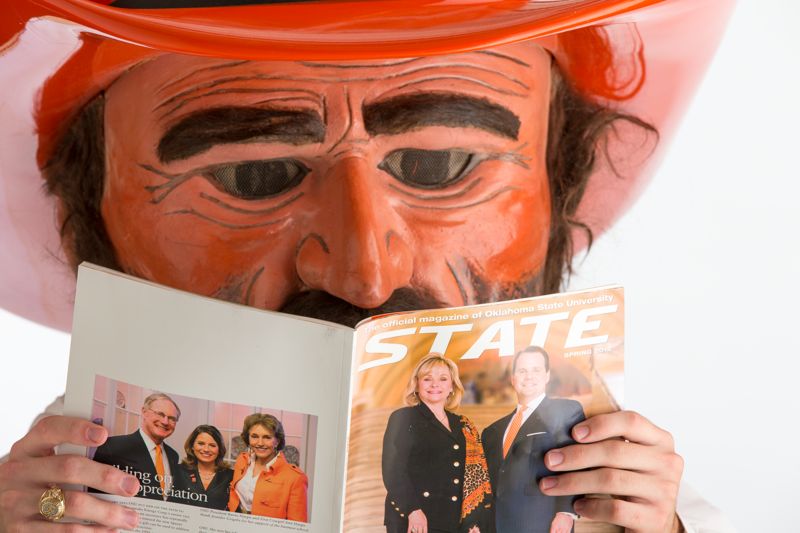 Older Pete reading STATE Magazine