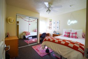 Bost Hall Bedroom decorated in white and pink