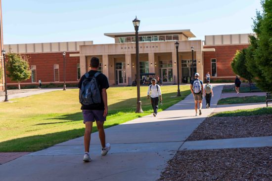 Students walking outside of the Residents Halls.