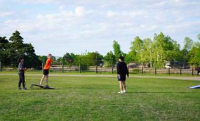 students playing cornhole at Morrison Neighborhood