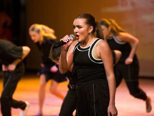 Student Singing and dancing during Varsity Revue