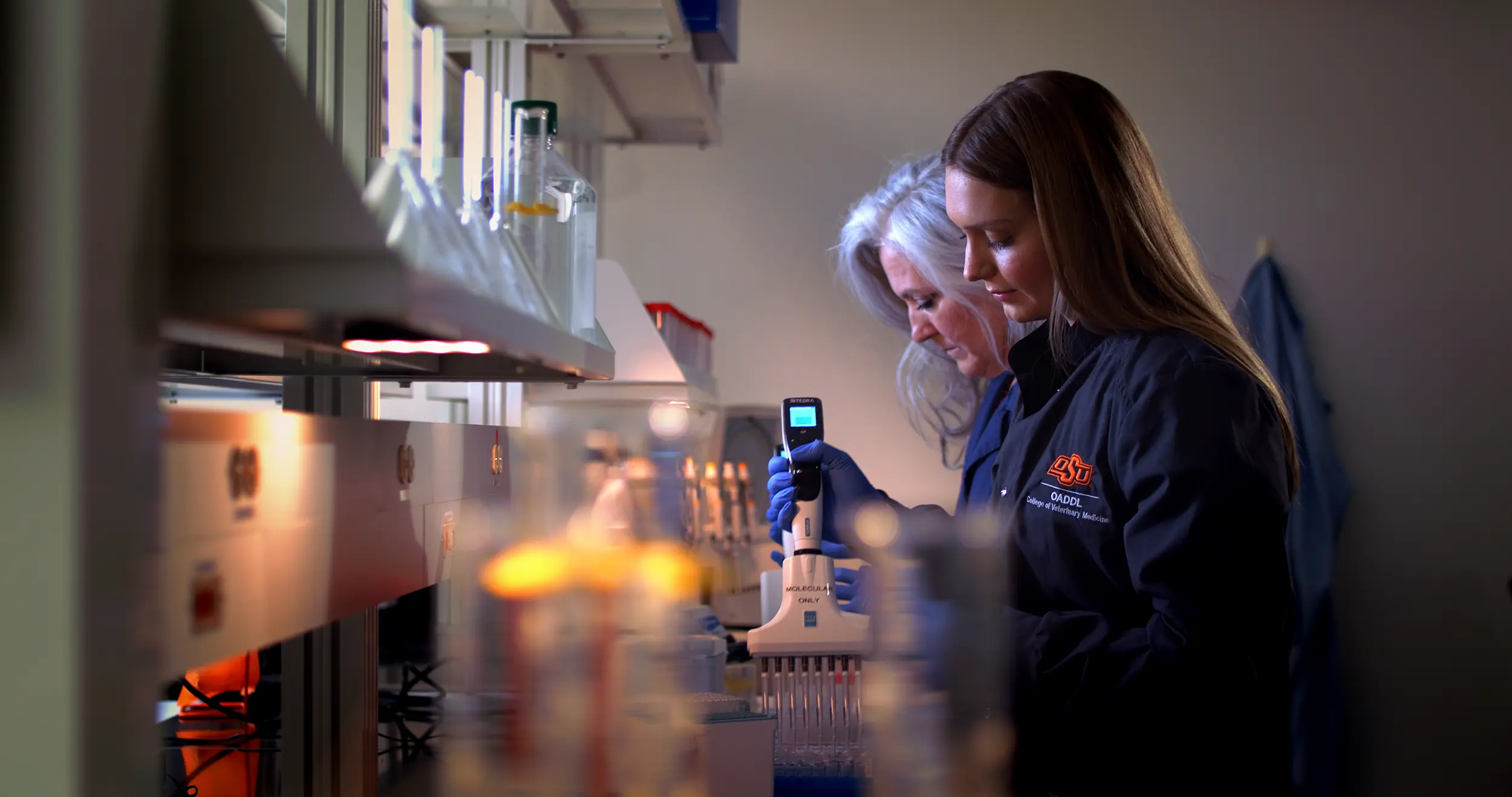 Student and professor in Oklahoma Animal Disease Diagnostic Laboratory.