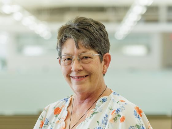 Woman wearing a floral patterned shirt